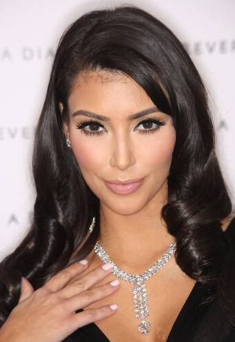 kim kardashian plastic surgery 2011. kim kardashian plastic surgery