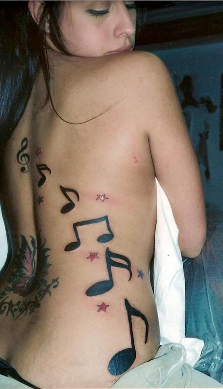 Star and Music Tattoos Design on the Back Women